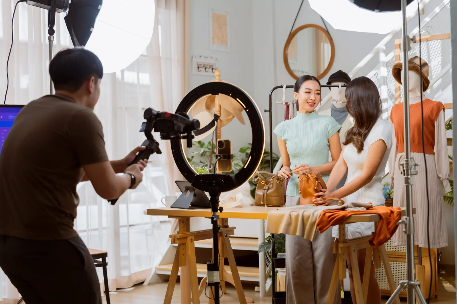 Small business team filming product content in a studio space